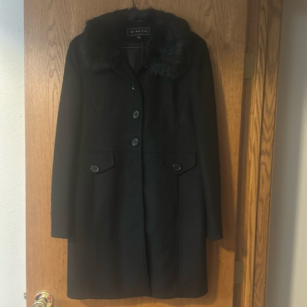 knee length women’s dress coat with faux fur collar.